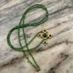 Lengthy beaded cross necklace